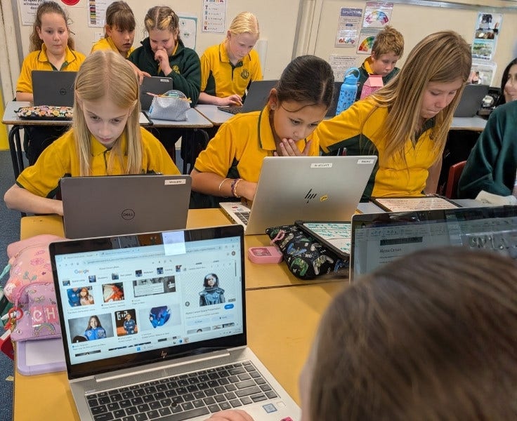 Students working on laptops