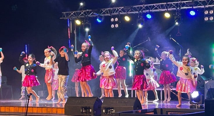 K-2 dance group performing on stage