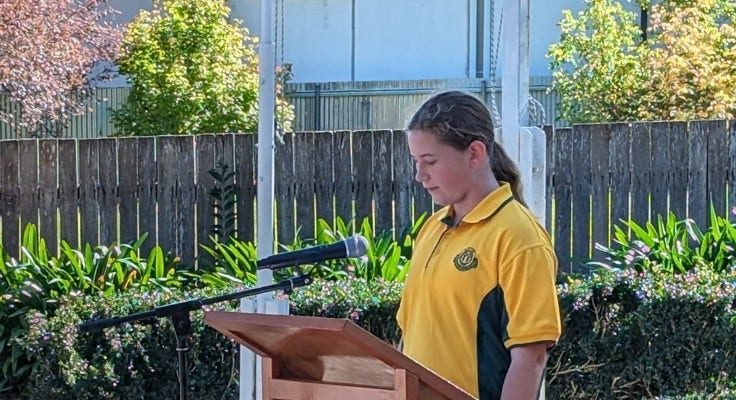 Girl speaking into microphone